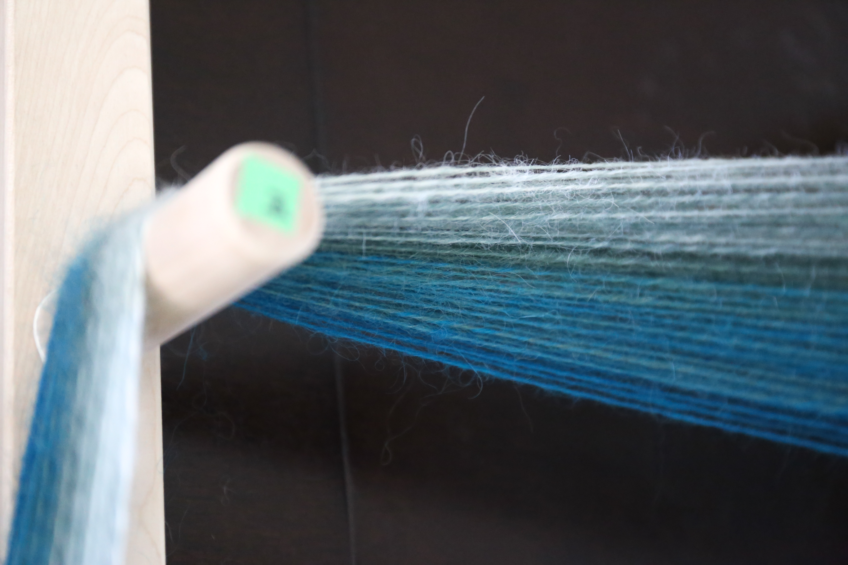 warping a rigid heddle on a board.